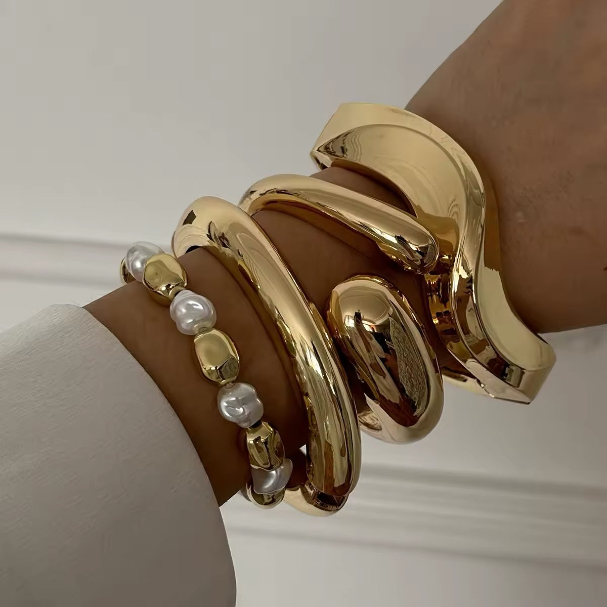 Vintage bohemian bracelet with a wide cuff design in gold