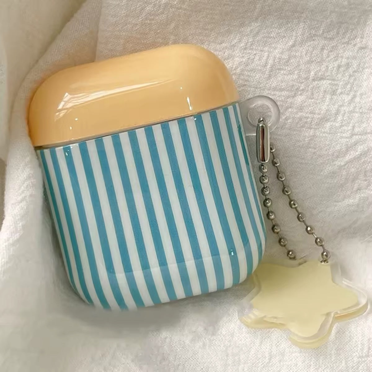 Minimalist retro style AirPods cover on flatlay