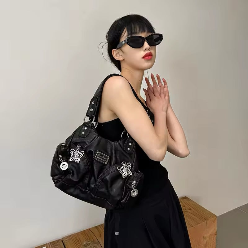 Vintage grunge shoulder bag in black faux leather