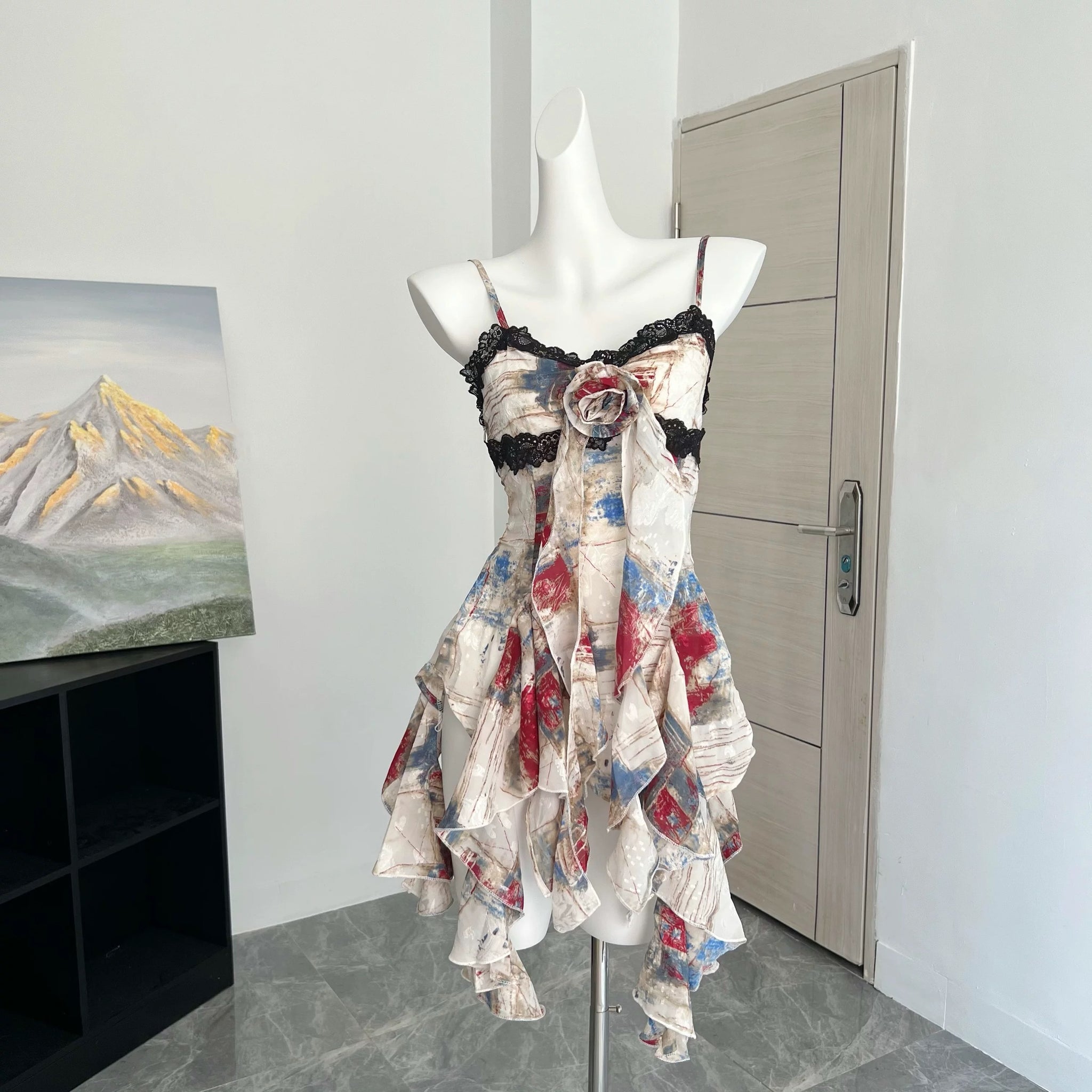 Y2K-inspired vintage gyaru crop top with lace ruffle trim and halter neck, featuring irregular hem and soft oil painting print