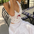 Fairycore knitted tank top with a vintage bow design