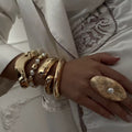 Irregular design gold bangle for fashion-forward looks