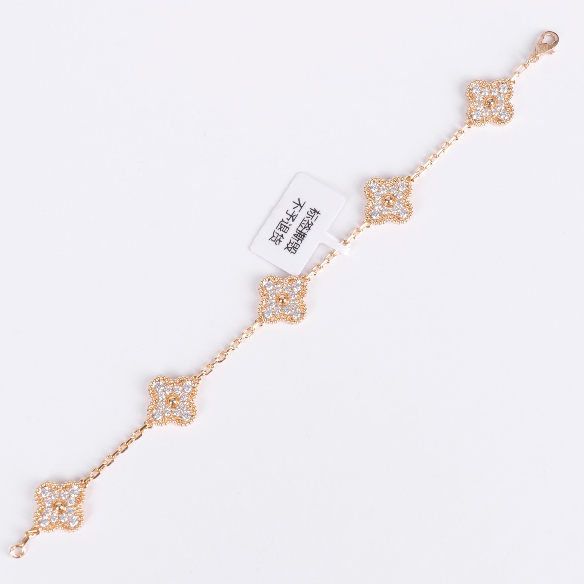 Waterproof clover bracelet with 18K gold plating and shimmer