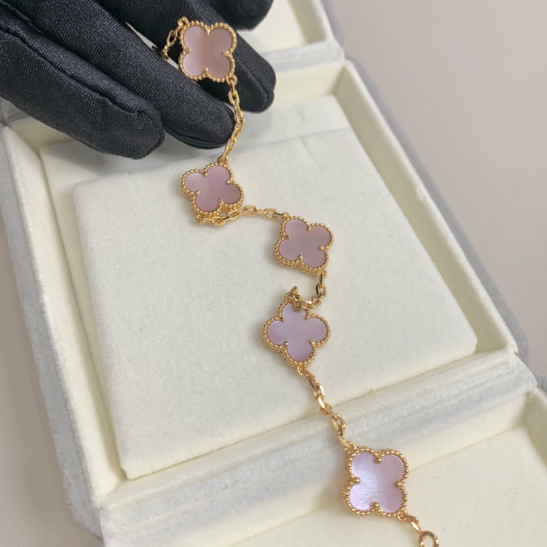 Designer bracelet with pink clover charm and waterproof gold base
