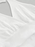 Close-up of white satin fabric with a soft texture on a light gray background