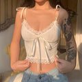 Y2K white coquette crop top with lace trim and bow details