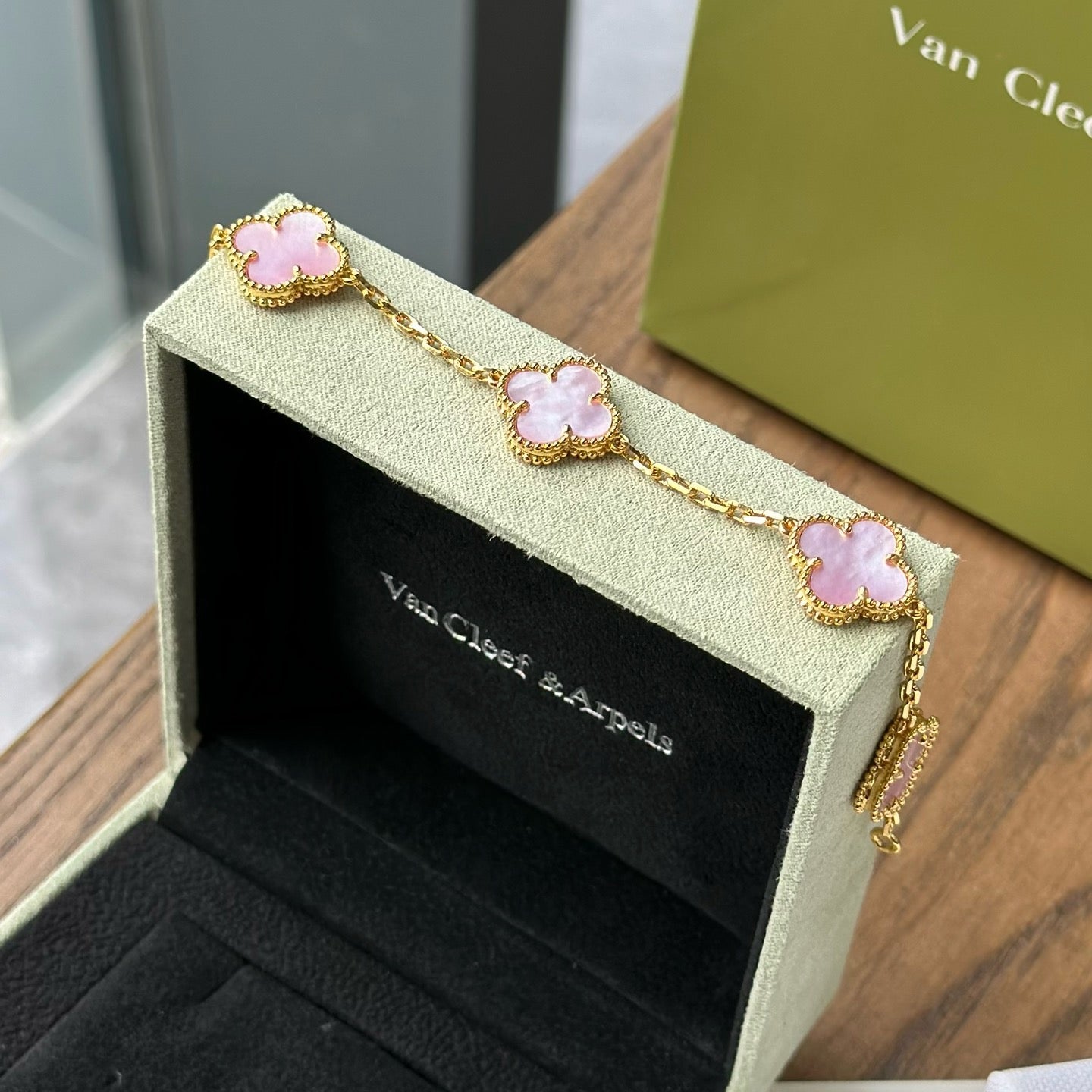 Fashion-forward black clover bangle with modern aesthetic