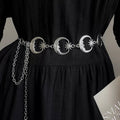 Witchcore outfit accessorized with moon waist chain and cosmic jewelry