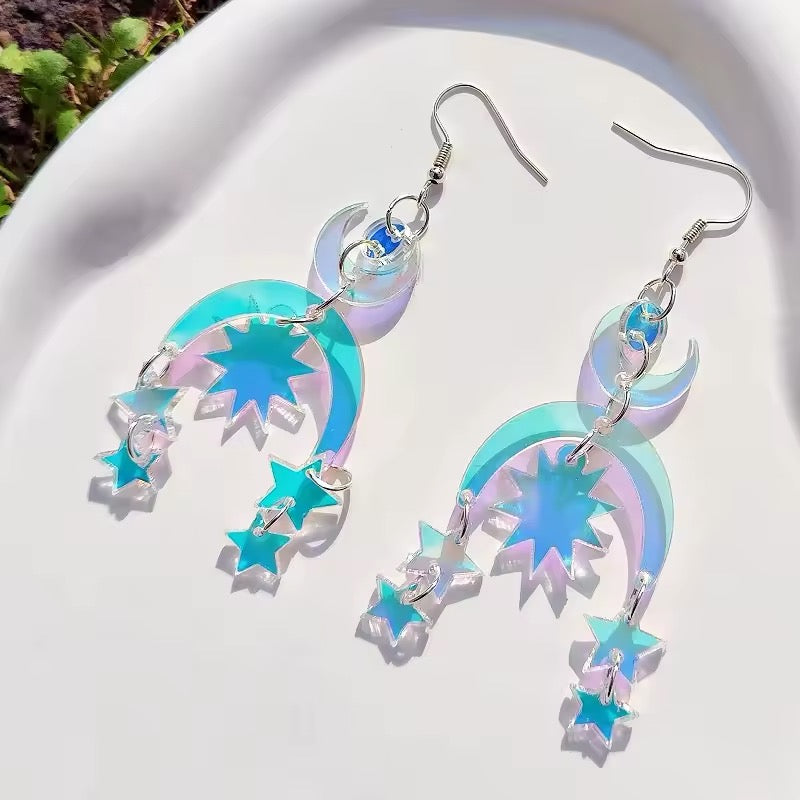 Laser-cut acrylic earrings featuring snake coiled around moon, witchy statement earrings with iridescent finish