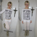 Alt style grunge long sleeve shirt for women with cross and bold typography