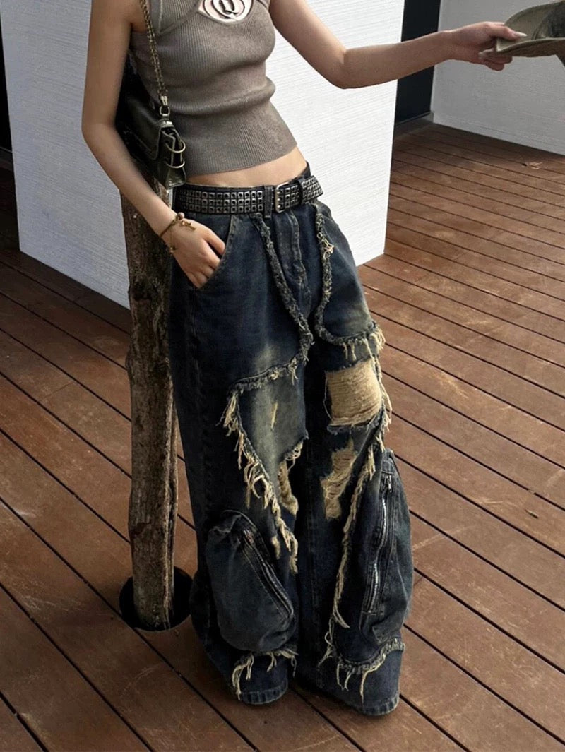 Vintage 2000s baggy jeans, high-waisted ripped cargo denim pants with gothic Harajuku aesthetic, Y2K-inspired streetwear fashion for women