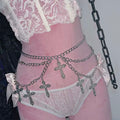 Hollow cross pendant belt styled with black dress