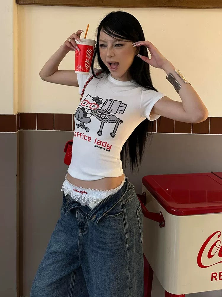 Model wearing the Y2K t-shirt paired with a pleated skirt, embodying college girl style