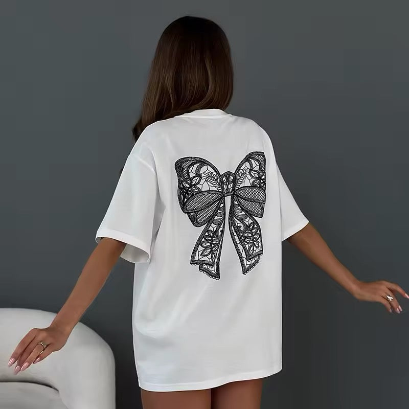 Minimalist bow T-shirt for women with cute print design, featuring Y2K Korean fashion influence and a casual loose-fit cotton short-sleeve style