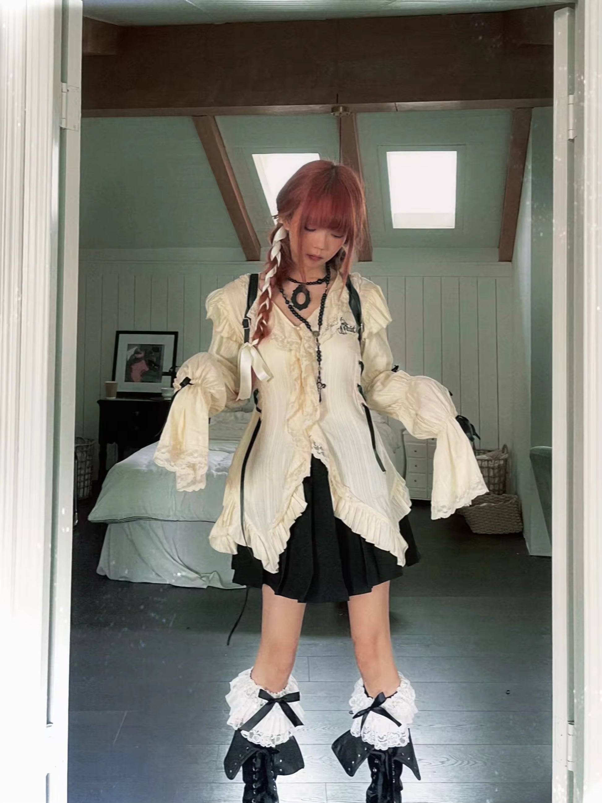 Y2K aesthetic top with puff sleeves and irregular bandage style