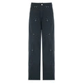 Front view of black low-waisted Y2K cargo jeans with silver rivets and wide-leg cut.