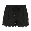 Black sporty Y2K shorts with side stripes and lace trim on the hem
