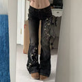 Low-rise 2000s vintage flared jeans with floral details