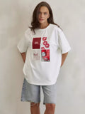 White short sleeve shirt with lipstick kisses and red car print design